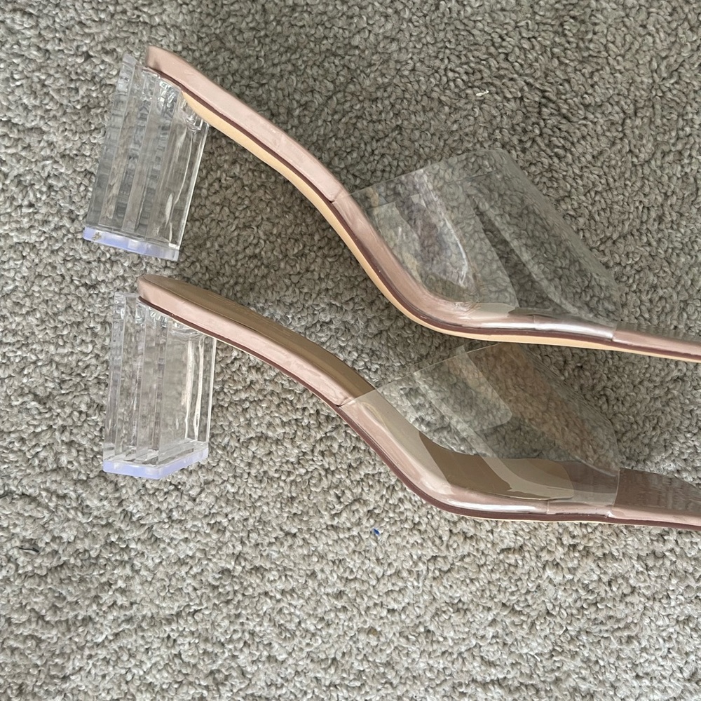 Clear heeled mules